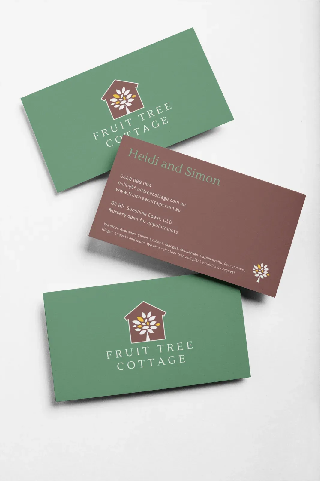 Fruit Tree Cottage business cards, green front with logo and brown back with contact details